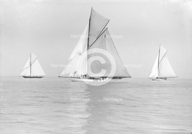 The Big Class yachts 'Britannia', 'Ma'oona', and 'Carina' sailing in light winds, 1913. Creator: Kirk & Sons of Cowes.