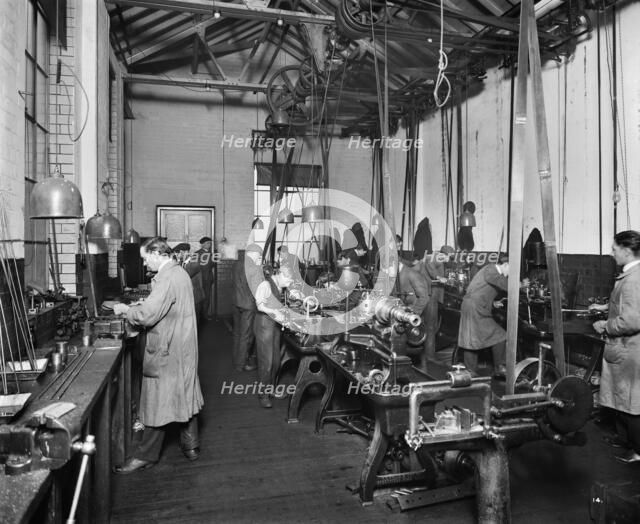 The Birmingham Small Arms factory, Small Heath, Birmingham, February 1917. Artist: Adolph Augustus Boucher.