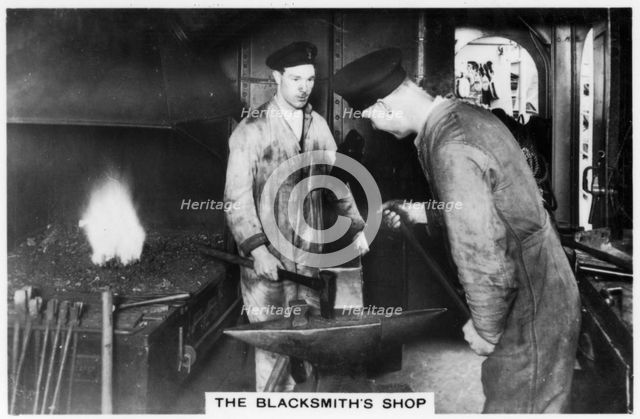 The blacksmith's shop on board the battleship HMS 'Nelson', 1937. Artist: Unknown