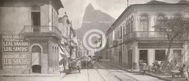 'The Botafogo end of the fashionable Rua Sao Clemente. Corcovado in the distance', 1914. Artist: Unknown.
