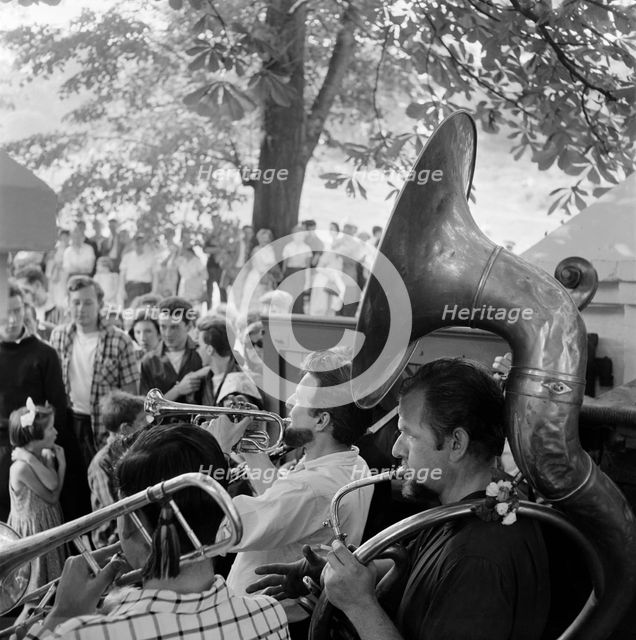 The brass section of a group of musicians, Hampstead Heath, London, c1946-c1959. Artist: John Gay