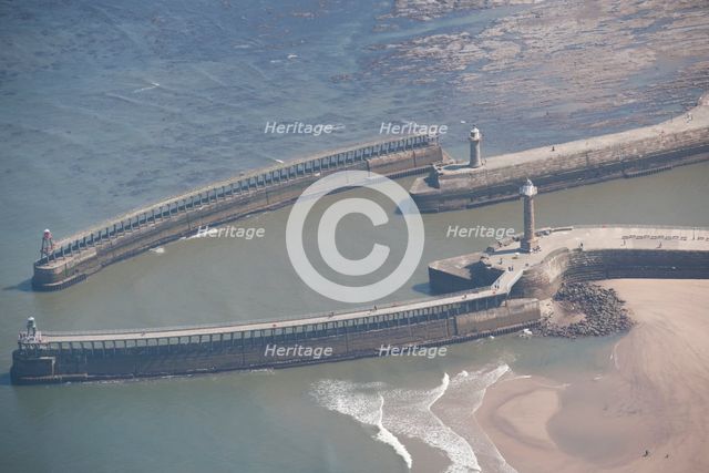 The breakwaters at the entrance to Whitby Harbour, North Yorkshire, 2016. Creator: Dave MacLeod.