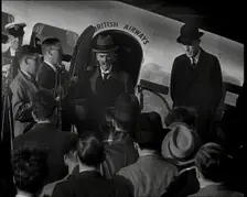 The British Prime Minister, Neville Chamberlain, Standing at the Door of a Lockheed Aero..., 1938. Creator: British Pathe Ltd
