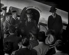 The British Prime Minister, Neville Chamberlain, Standing at the Door of a Lockheed Aero..., 1938. Creator: British Pathe Ltd