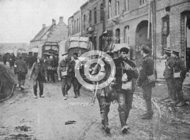 'The British wounded returning to a dressing station after an attack', 1915. Artist: Unknown.