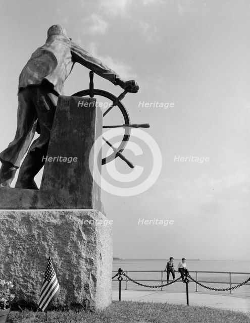 The bronze fisherman, a memorial to men lost at sea, Gloucester, Massachusetts, 1943. Creator: Gordon Parks.