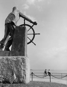 The bronze fisherman, a memorial to men lost at sea, Gloucester, Massachusetts, 1943. Creator: Gordon Parks