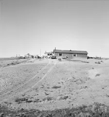 The Browning home, a partial dugout, Dead Ox Flat, Malheur County, Oregon, 1939. Creator: Dorothea Lange