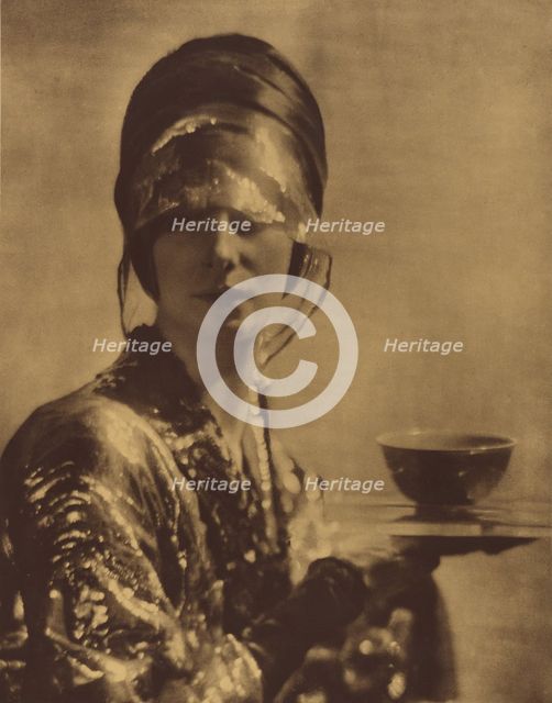 The Cup. Portrait of a woman holding a cup, c1910. Creator: Baron Adolf Edward Sigismond de Meyer.