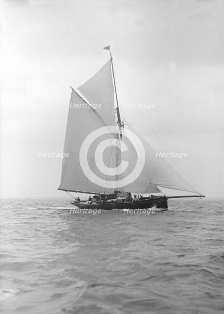 The cutter 'Vanity' sailing close-hauled, 1913. Creator: Kirk & Sons of Cowes.