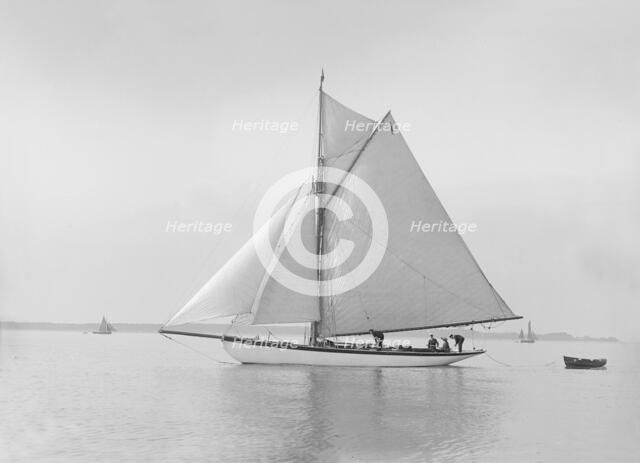 The cutter 'Wenda' in light winds, 1912. Creator: Kirk & Sons of Cowes.