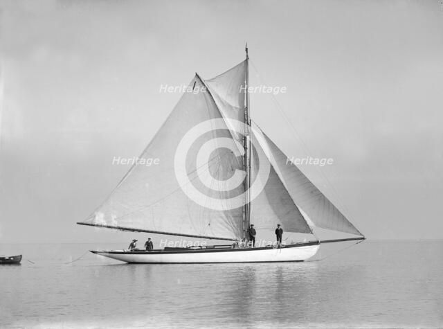 The cutter 'Wenda' in light winds, 1912. Creator: Kirk & Sons of Cowes.