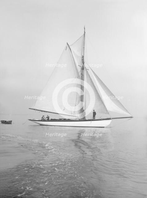 The cutter 'Wenda' in light winds, 1912. Creator: Kirk & Sons of Cowes.