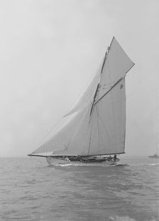 The cutter Westwind sailing close-hauled, 1914. Creator: Kirk & Sons of Cowes