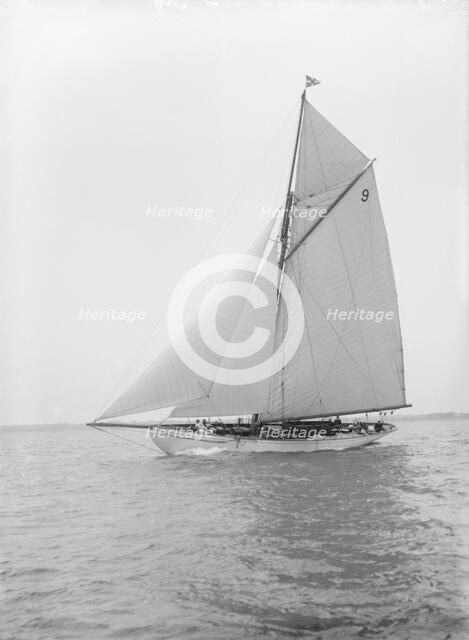 The cutter 'Westwind' sailing close-hauled, 1912. Creator: Kirk & Sons of Cowes.
