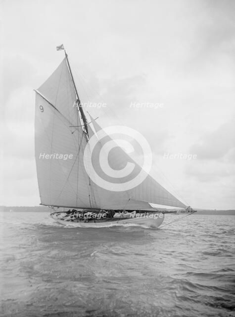 The cutter 'Westwind' sailing close-hauled, 1912. Creator: Kirk & Sons of Cowes.