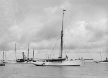 The cutter Yolande at anchor, 1912. Creator: Kirk & Sons of Cowes
