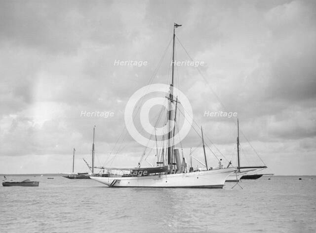 The cutter 'Yolande' at anchor, 1912. Creator: Kirk & Sons of Cowes.
