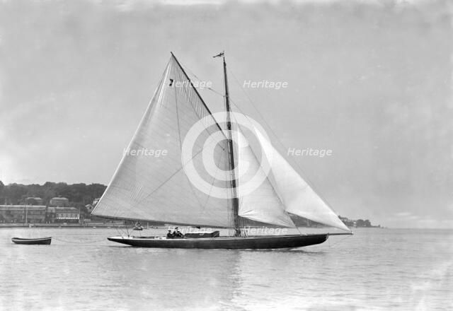 The cutter 'Eve' under sail, 1911. Creator: Kirk & Sons of Cowes.