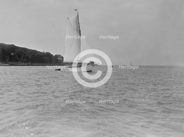 The cutter 'Fantome' towing tender, 1920. Creator: Kirk & Sons of Cowes.