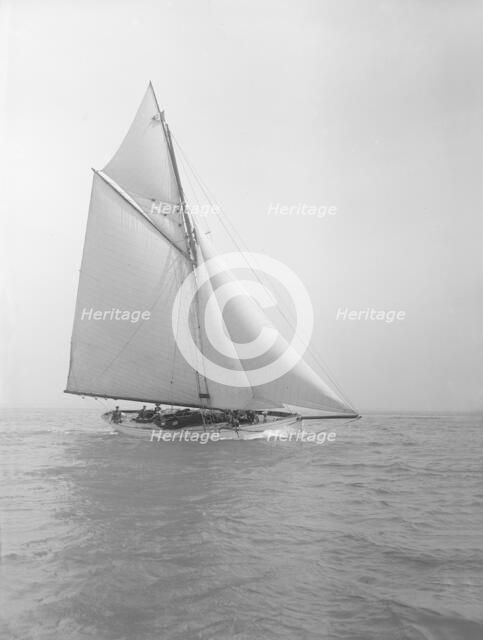The cutter 'Grisette' sailing close-hauled, 1913. Creator: Kirk & Sons of Cowes.