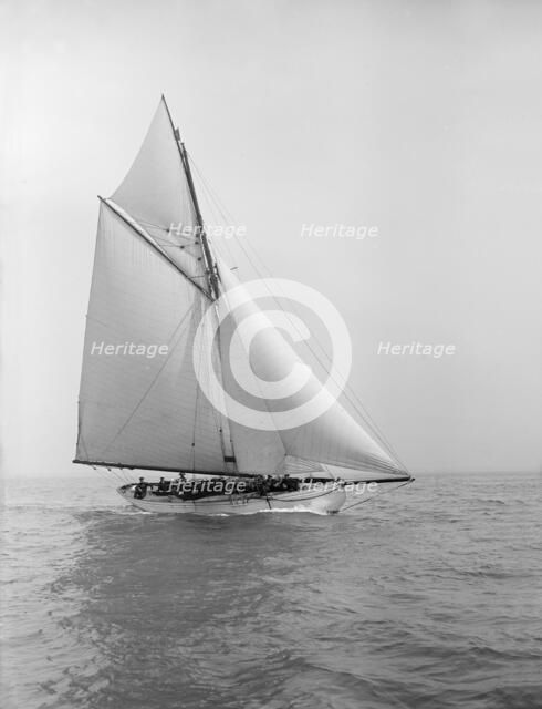 The cutter 'Grisette' sailing close-hauled, 1913. Creator: Kirk & Sons of Cowes.