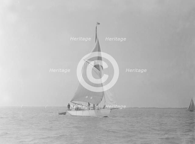 The cutter 'Mavourneen' running downwind, 1922. Creator: Kirk & Sons of Cowes.