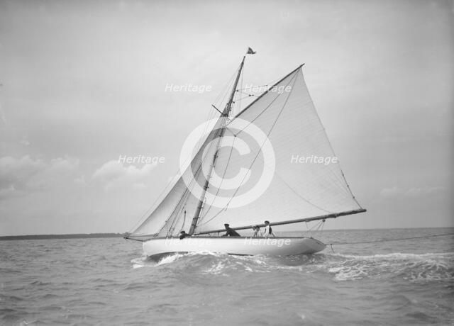 The cutter 'Nanette' sailing close-hauled, 1911. Creator: Kirk & Sons of Cowes.