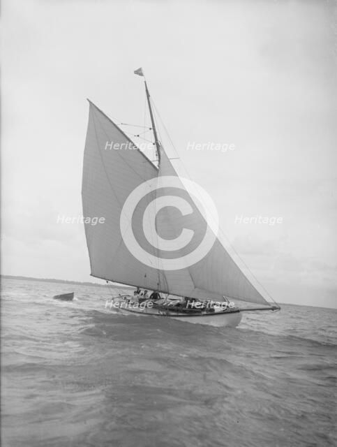 The cutter 'Nanette' sailing close-hauled, 1911. Creator: Kirk & Sons of Cowes.