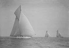 The cutter Onda sailing under spinnaker, 1911. Creator: Kirk & Sons of Cowes