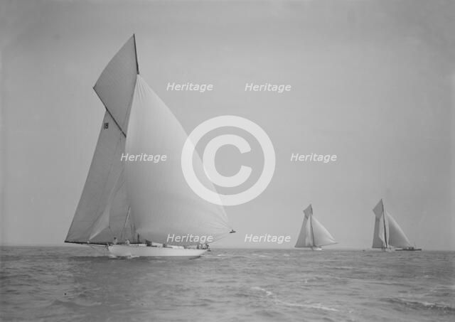 The cutter 'Onda' sailing under spinnaker, 1911. Creator: Kirk & Sons of Cowes.