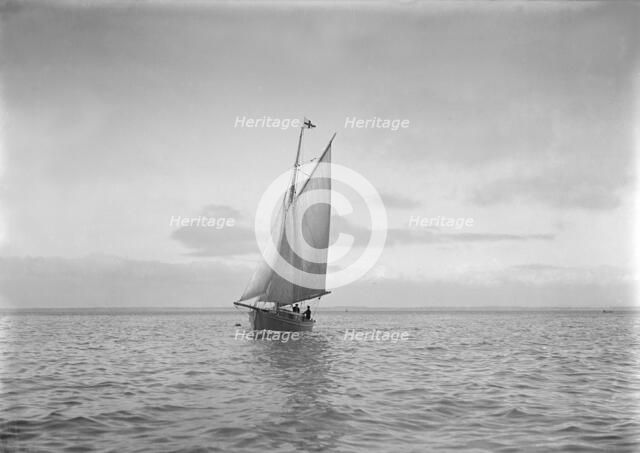 The cutter 'Sophie' sailing. Creator: Kirk & Sons of Cowes.