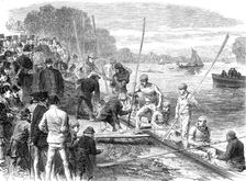 The Cambridge University boat crew returning from practice, 1870. Creator: Unknown