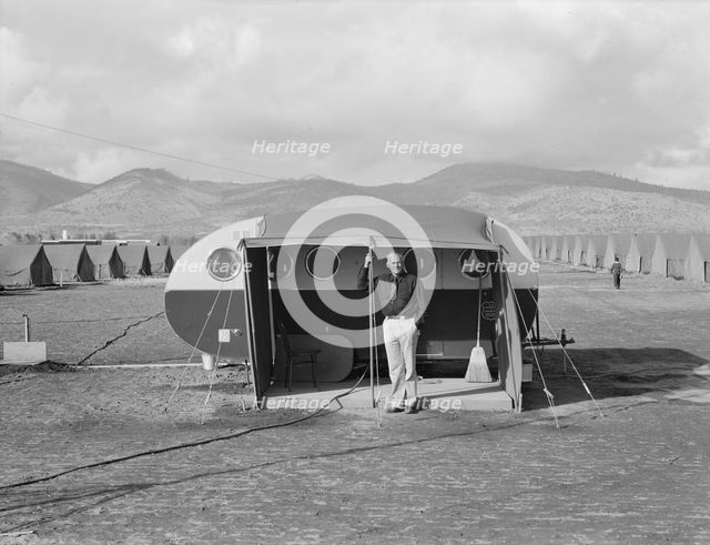 The camp manager, the office trailer and view of FSA camp, Merrill, Klamath County, Oregon, 1939. Creator: Dorothea Lange.