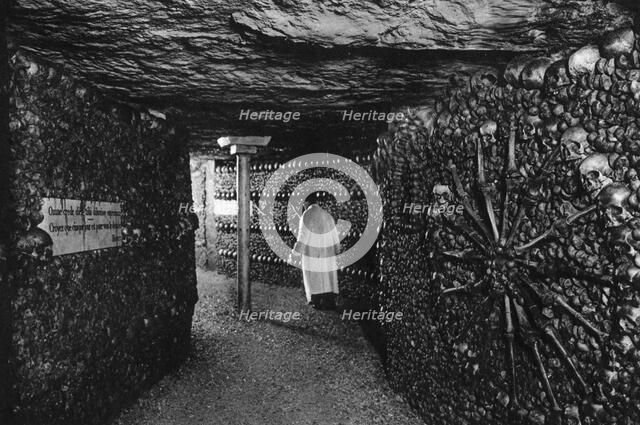 The Catacombs, Paris, 1931.Artist: Ernest Flammarion