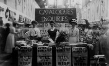 The catalogue and enquiries stall at the Women's exhibition, May 1909. Creator: Unknown