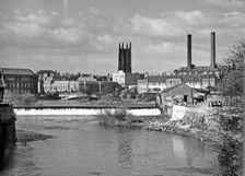 The Cathedral and the weir on the River Derwent, Derby, Derbyshire. Creator: H Brighouse