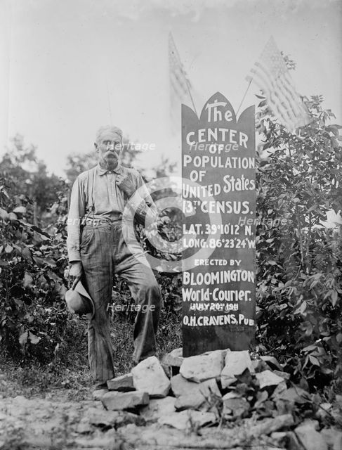 The Center of Population of U.S. [man standing next to memorial stone], between c1910 and c1915. Creator: Bain News Service.