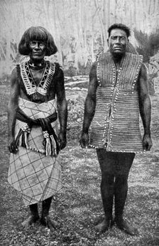 The ceremonial costume of war and everyday waist-cloth, Gilbert Islands 1922. Artist: Thomas McMahon