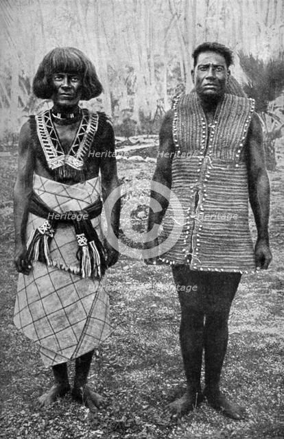 'The ceremonial costume of war and everyday waist-cloth, Gilbert Islands', 1922. Artist: Thomas McMahon