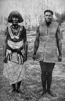 The ceremonial costume of war and everyday waist-cloth, Gilbert Islands 1922. Artist: Thomas McMahon