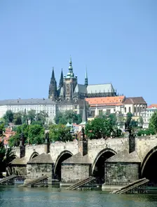 The Charles Bridge the castle and St Vitus Cathedral, Prague, Czech Republic. Creator: Peter Thompson