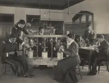 The cheese press screw - students studying agricultural sciences, Hampton Institute..., 1899 or 1900 Creator: Frances Benjamin Johnston