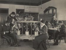 The cheese press screw - students studying agricultural sciences, Hampton Institute..., 1899 or 1900 Creator: Frances Benjamin Johnston