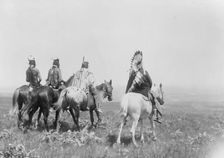 The chief and his staff, Apsaroke Indians, c1905. Creator: Edward Sheriff Curtis