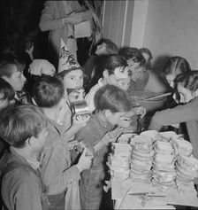 The children at Halloween party in Shafter migrant camp, California, 1938. Creator: Dorothea Lange