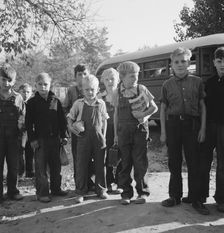 The children from Dead Ox Flat get off bus at school yard, Ontario, Malheur County, Oregon, 1939. Creator: Dorothea Lange