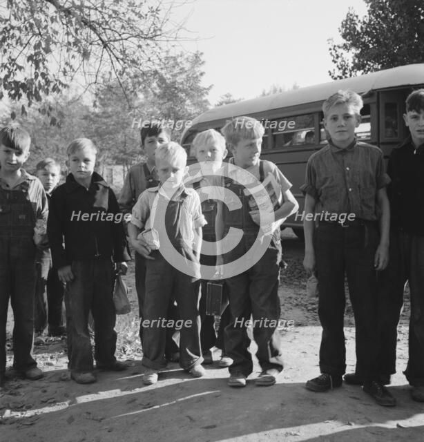 The children from Dead Ox Flat get off bus at school yard, Ontario, Malheur County, Oregon, 1939. Creator: Dorothea Lange.