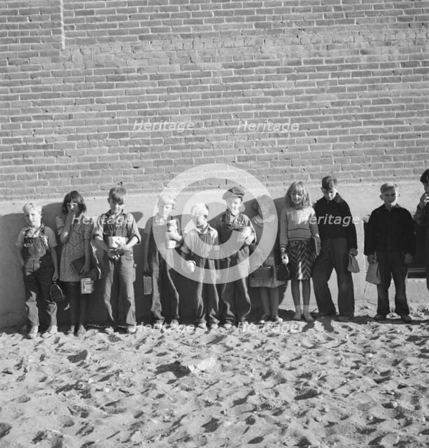 The children from Dead Ox Flat ready to march into the school..., Malheur County, Oregon, 1939. Creator: Dorothea Lange.