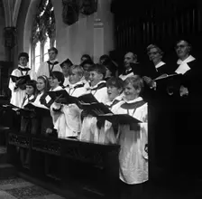 The choir from Brampton Parish Church singing during a service, Rotherham, 1969. Creator: Michael Walters